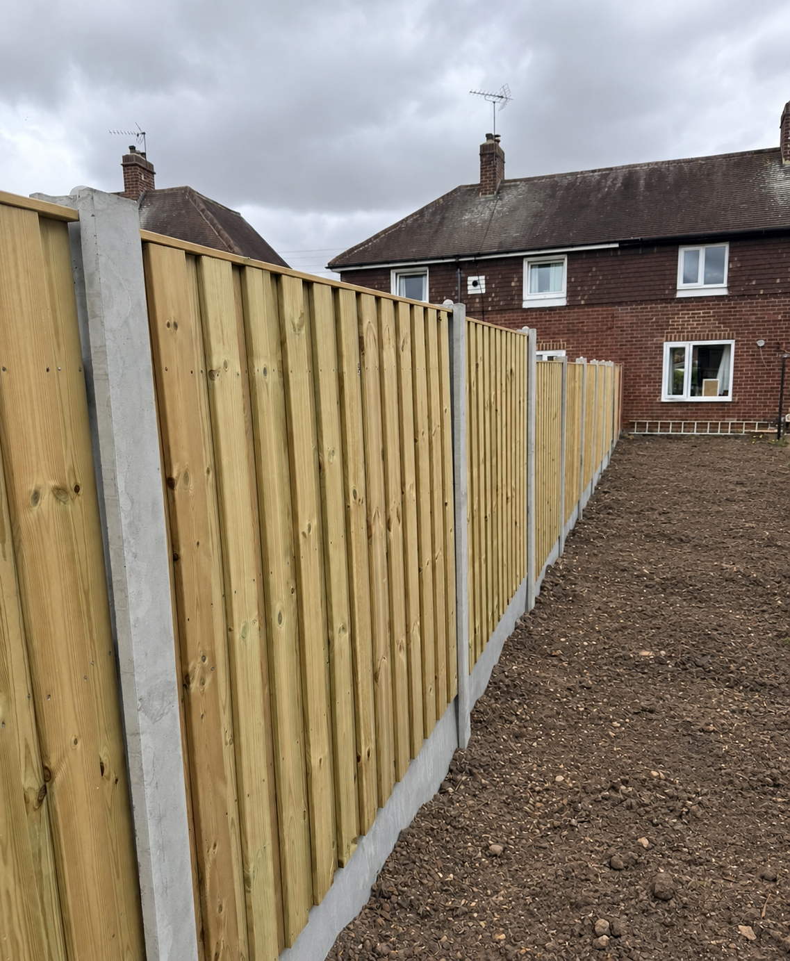 Timber and concrete fencing installed by White Rose
